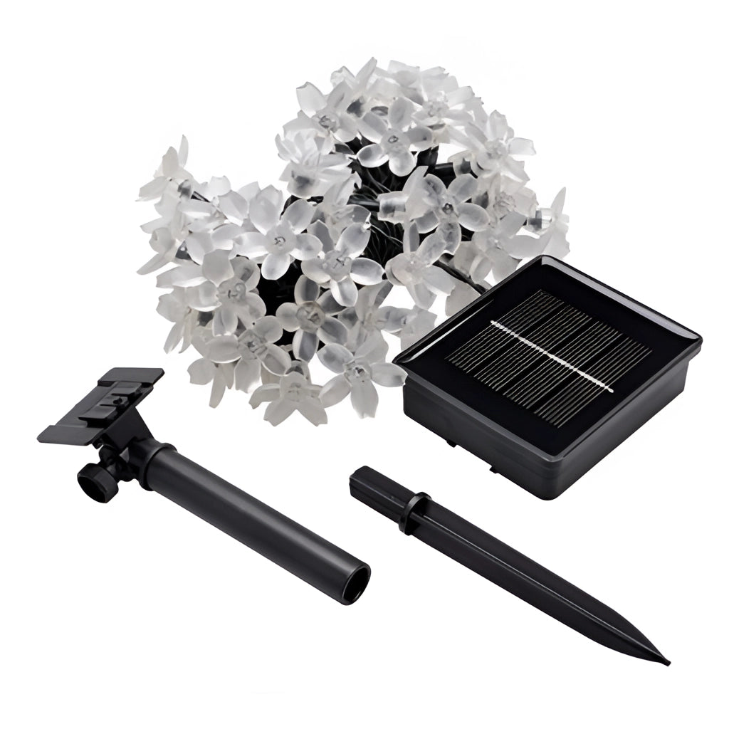 Solar Flower Garden LED Light Strips illuminating colorful petal designs in a garden setup.