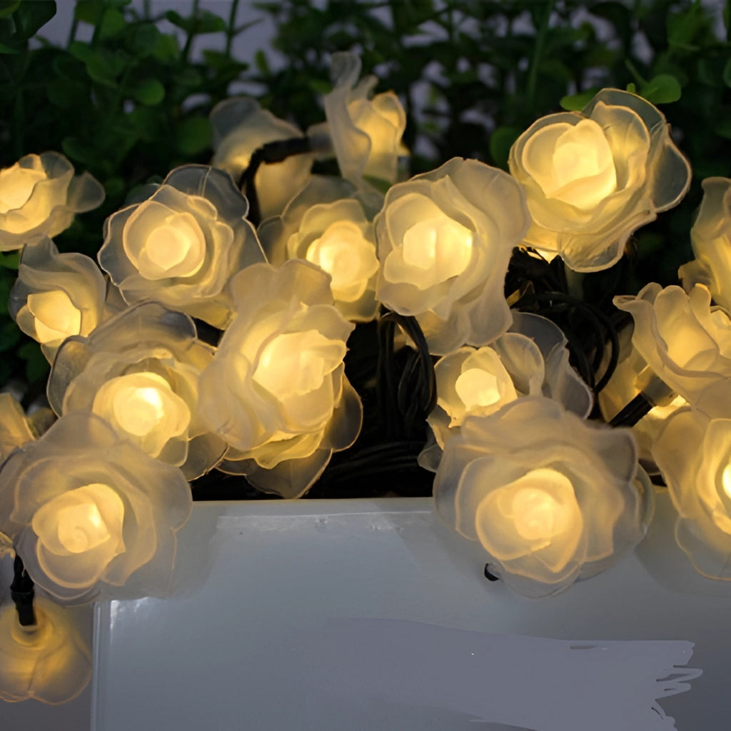 Solar Flower Garden LED Light Strips featuring rose warm lights, depicting illuminated rose petals in a garden setting.