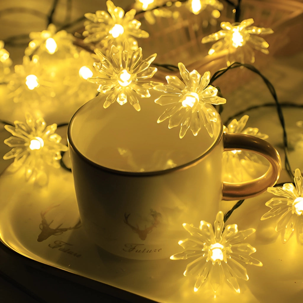 Solar Flower Garden LED Light Strips in chrysanthemum warm color, featuring decorative golden petals and designed for garden decoration.