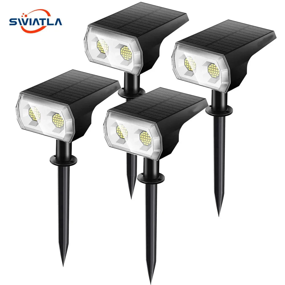 Solar landscape spotlights with IP65 waterproof rating, featuring RGB and white lighting options, shown with a durable design suitable for outdoor use.
