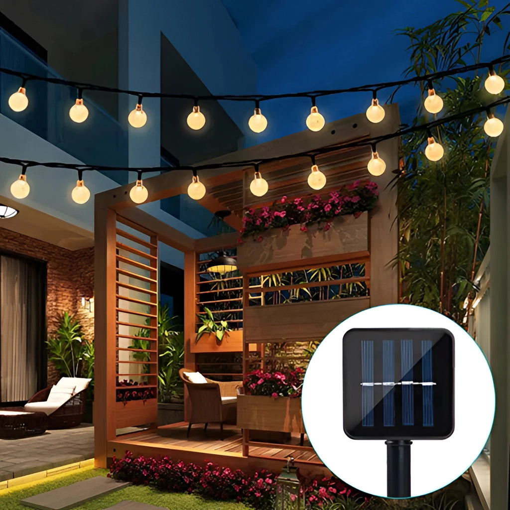Solar string lights with IP65 waterproof RGB and white LEDs illuminating a room with houseplants and a decorated interior.