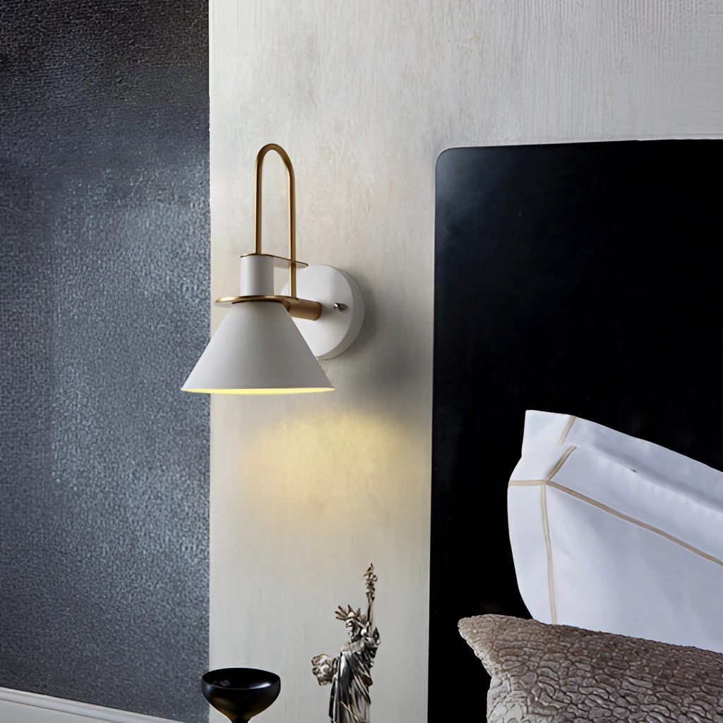 Elegant retro wall light with matt finish, featuring a rectangular wooden base and metal accents, illuminating a cozy interior room with a couch and art decor.