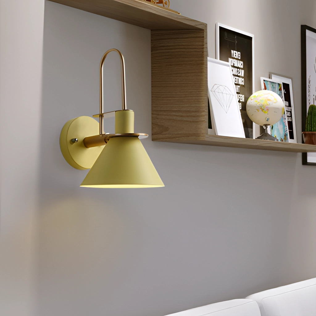 Elegant retro wall light with a matt finish, mounted on a wooden wall with shelving and framed art in a stylish interior design setting.