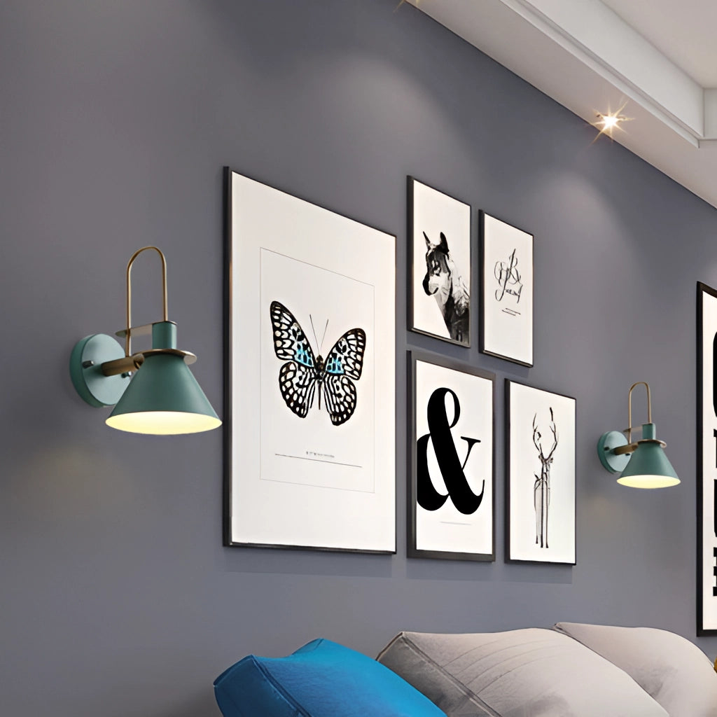 Wall light with elegant retro design and matt finish, mounted on a wall next to framed butterfly art.