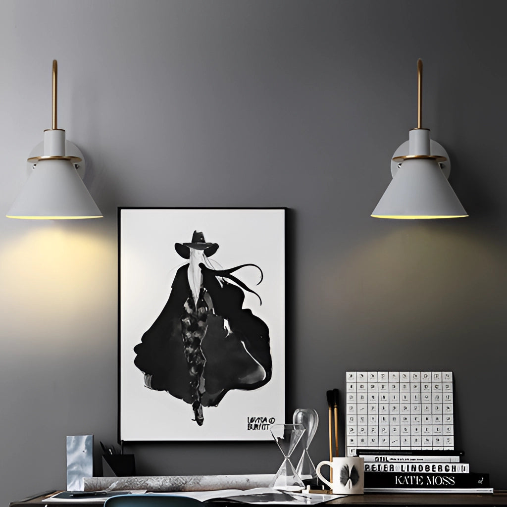 Elegant retro-designed wall light with a matt finish, featuring a sleek grey shade, mounted on a wall with a picture frame in the background.