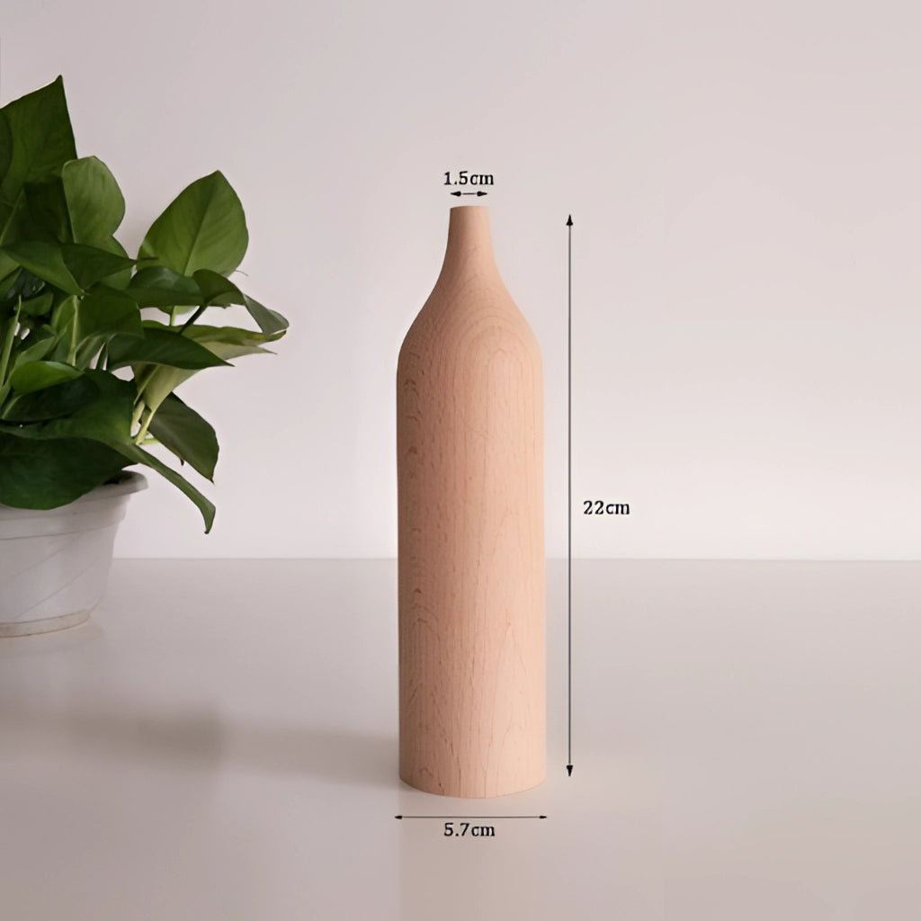 Tall wooden decor vase, variant J004, holding houseplant on a table.
