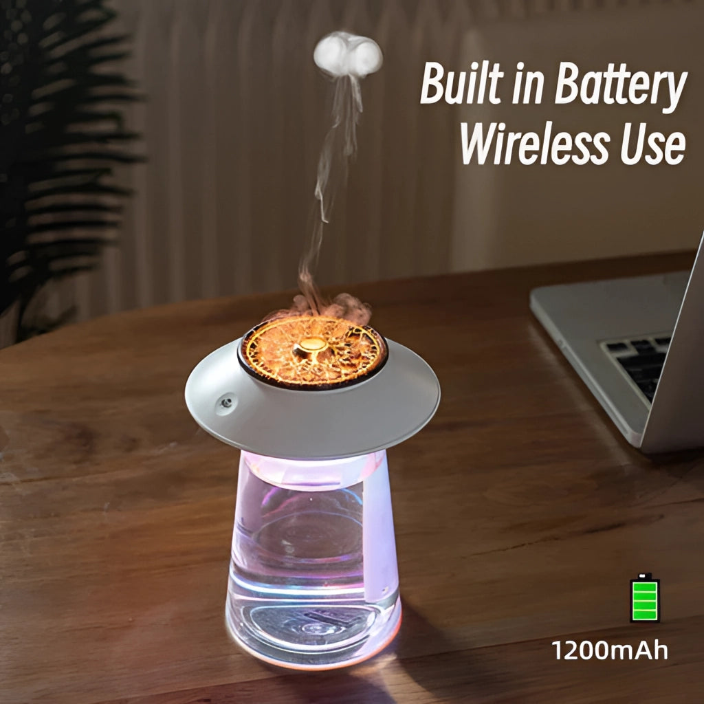 760ml USB Rechargeable Ultrasonic Mist Maker on a table with drinkware and a laptop in the background.