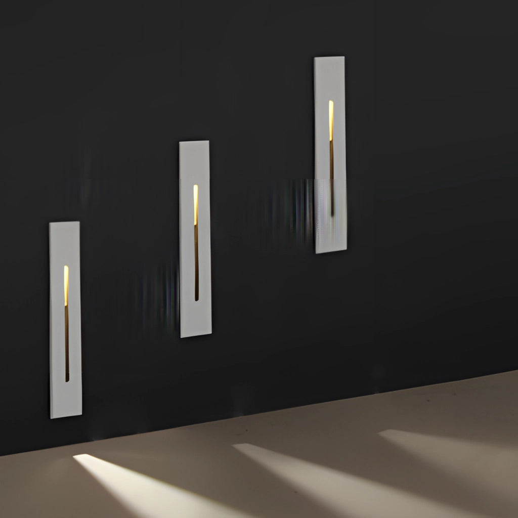 Modern rectangular black and white ambient glow wall light mounted on a sleek grey wall, suitable for both indoor and outdoor use, made of aluminum and waterproof with IP65 rating.