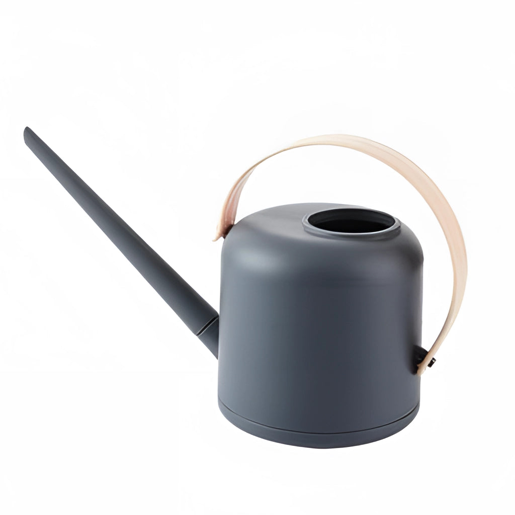 Modern and functional April Showers garden watering can in charcoal and pink colors, designed for efficient plant watering.