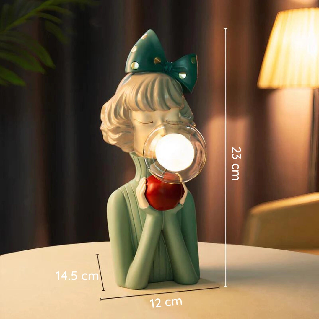 Handcrafted wooden table lamp named Rosie with a whimsical, cartoon-inspired design featuring a wooden base and glass elements.