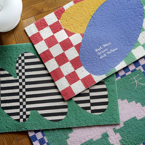 Back to the Future Inspired Geometric Entrance Doormat with a white and green rectangular pattern featuring creative geometric lines and shapes.