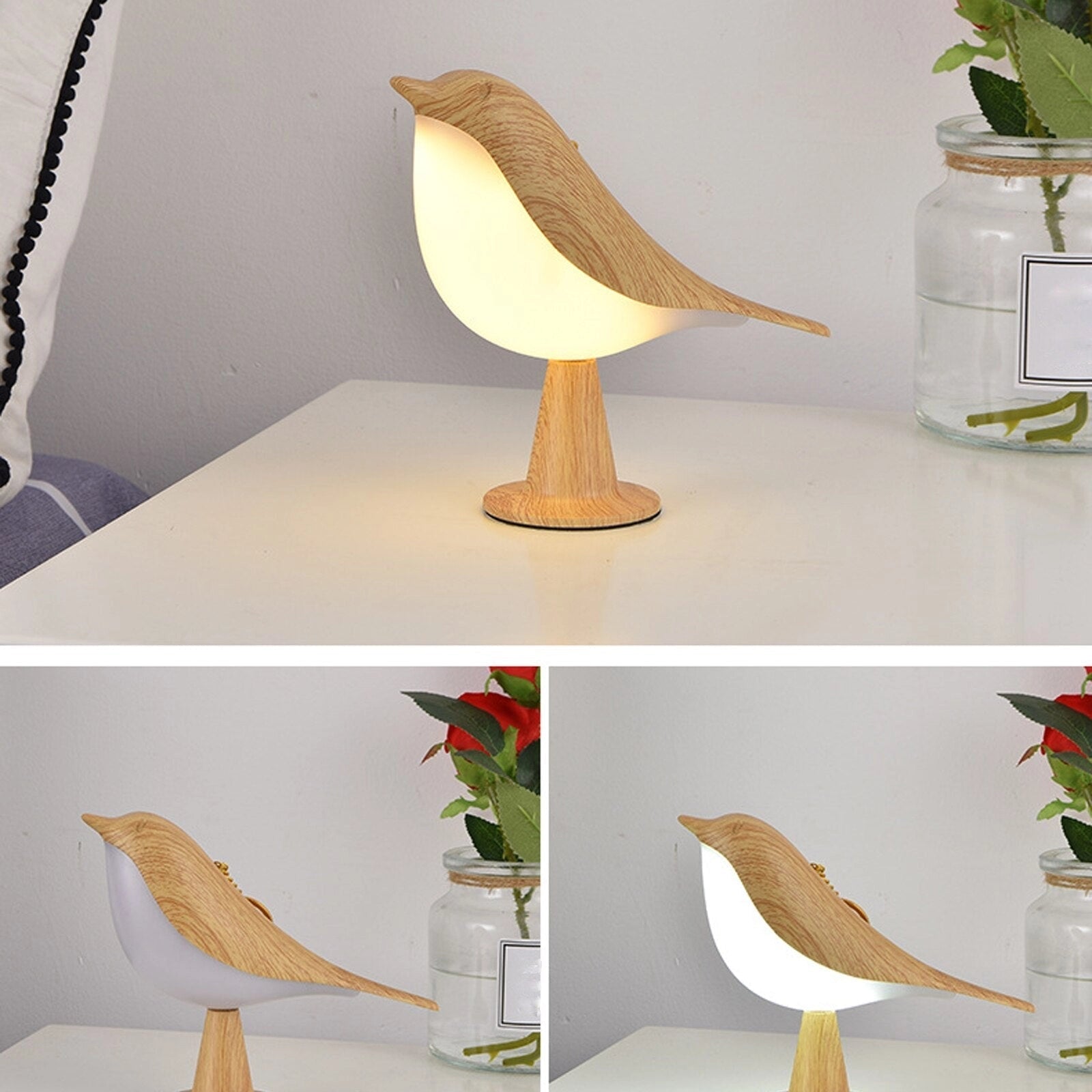 A cordless table nightstand lamp with a dimmable LED light shaped like a bird, placed on a wooden table next to a potted houseplant.