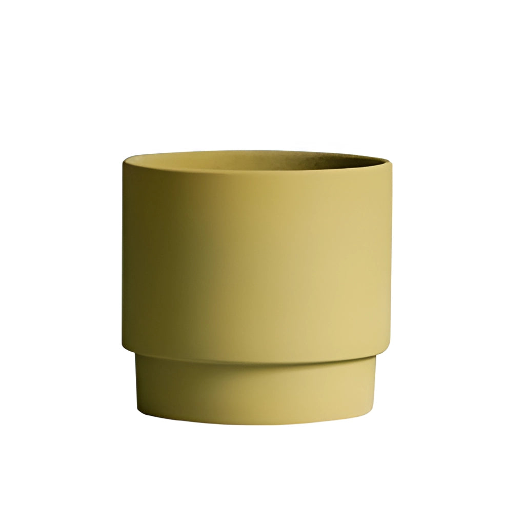 Bright Porcelain Stackable Flowerpot Planters in Avocado color displayed on a wooden table.