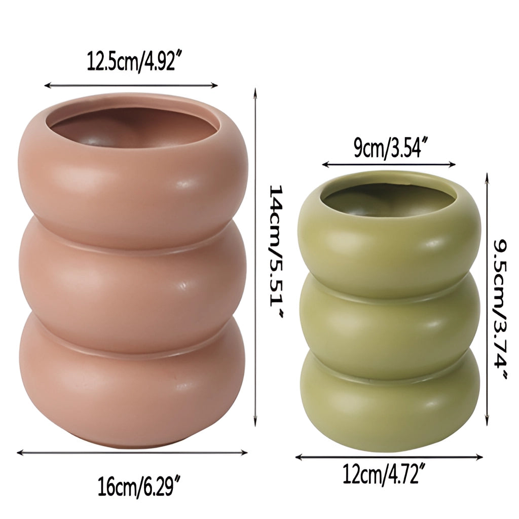 Round ceramic bubble glass planter vase, displayed empty on a flat surface, showcasing its artistic and elegant design.