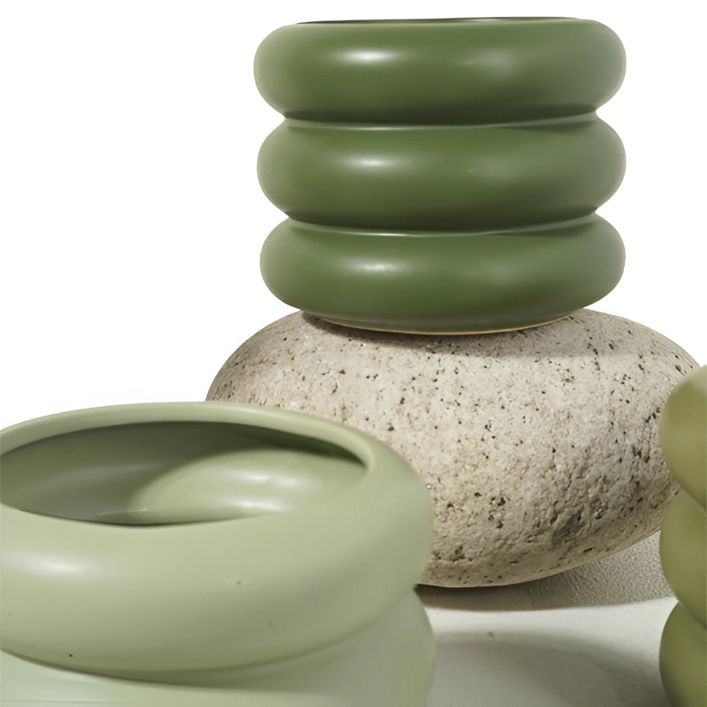 Ceramic round bubble glass planter vase with a sleek design placed on a tabletop.