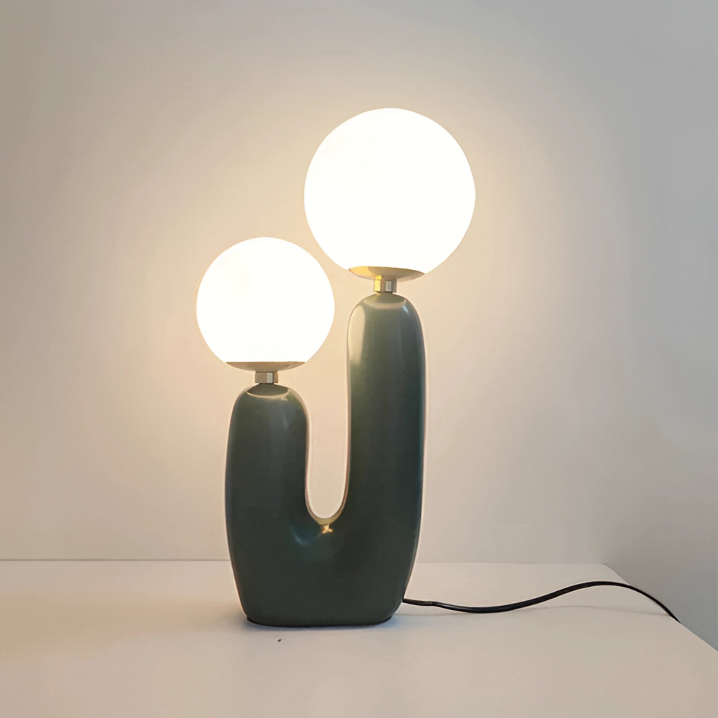 Cactus Design Table Lamp with Milk Glass Globes and LED Innovation featuring wooden base, artistic tints, circular milk glass shades, and modern LED lighting.
