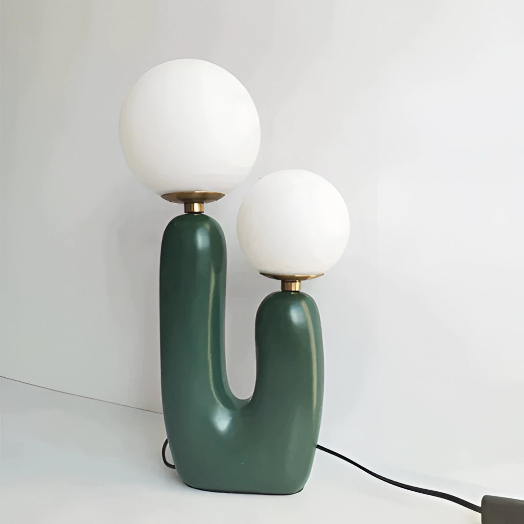Cactus Design Table Lamp with Milk Glass Globes and LED Innovation featuring unique cactus-inspired structure, elegant milk glass globes, and a modern LED lighting system, positioned on a table.