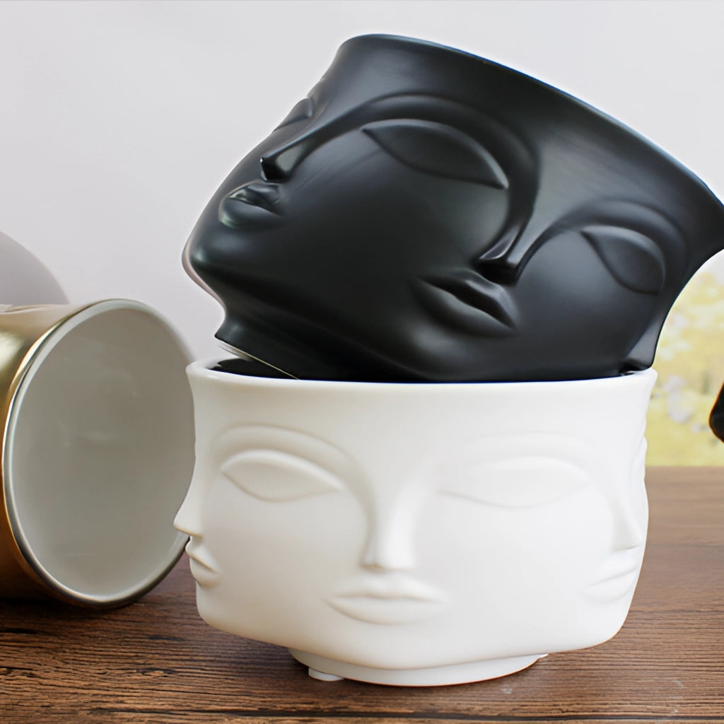 Modern Ceramic Face Design Flowerpot, ideal for succulents, featuring an artistic earthenware aesthetic with smooth porcelain finish, displayed on a wooden surface.