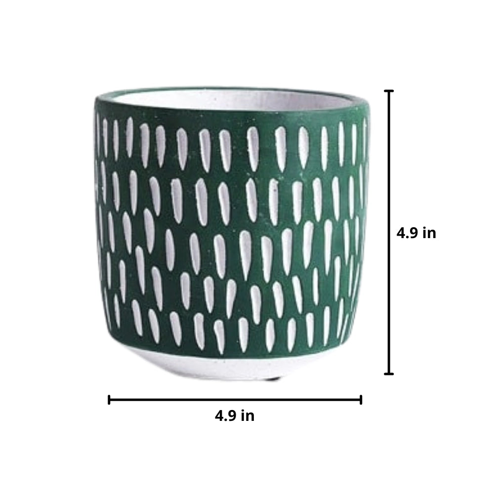 Hand-painted green ceramic planter with textured design, cylindrical shape, and intricate patterns.