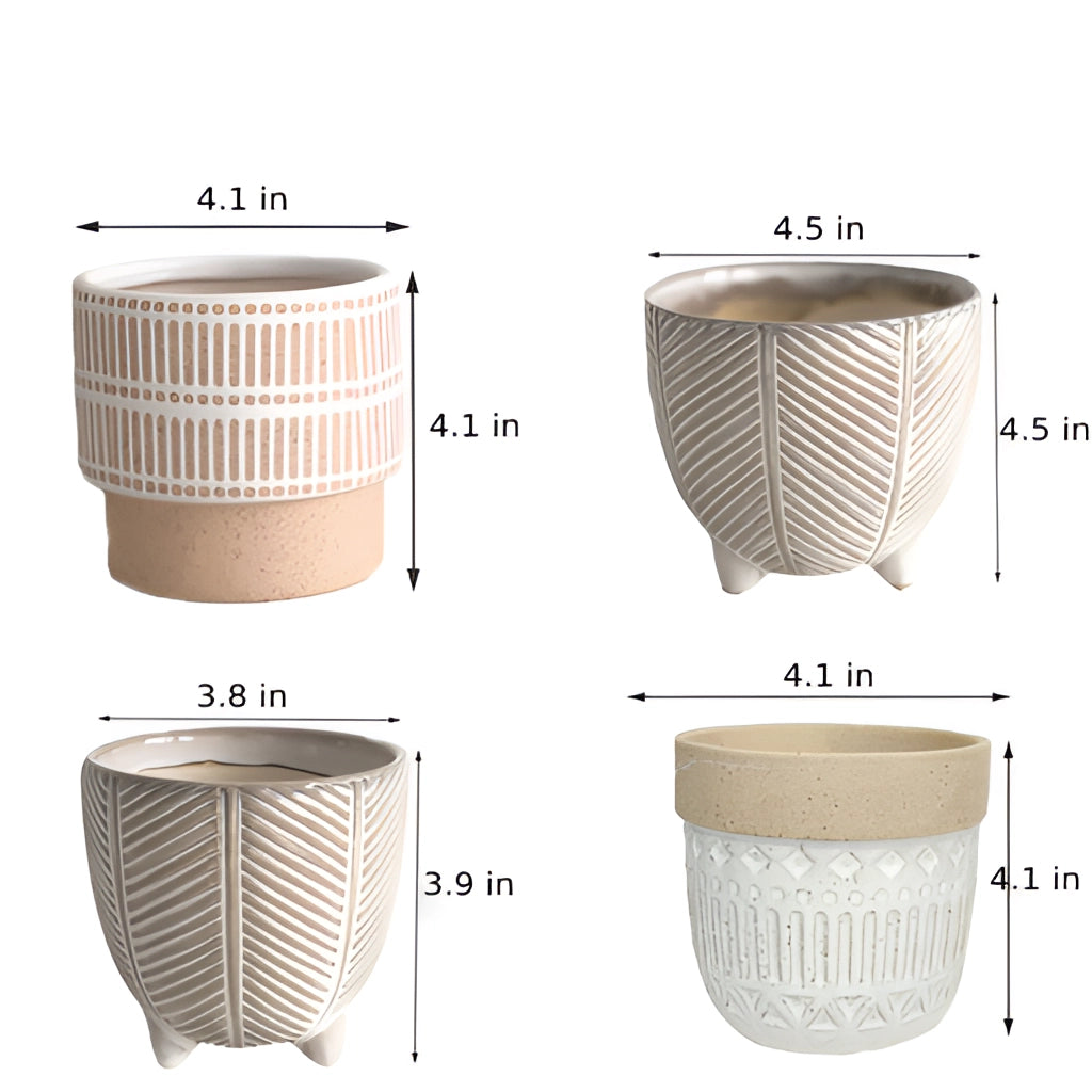 White rectangular ceramic holiday plant pots with decorative line patterns.
