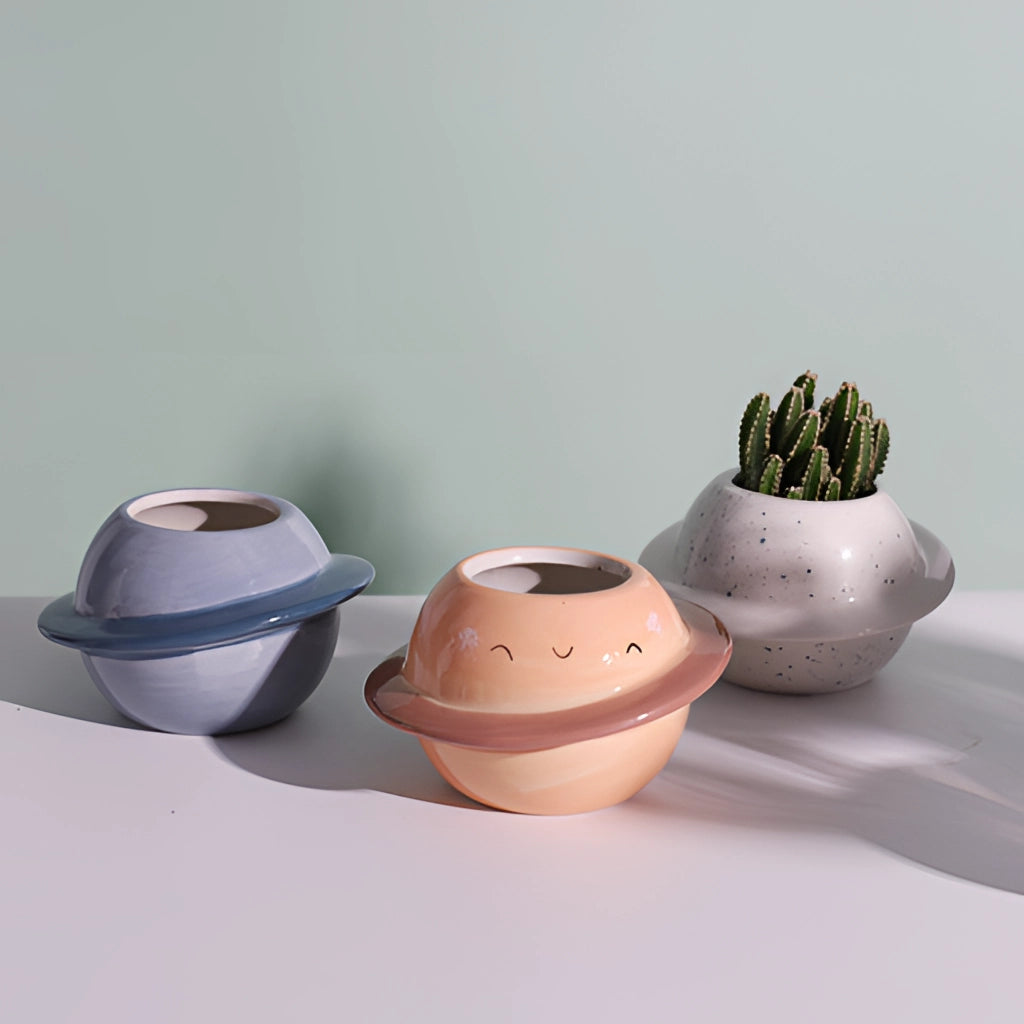 Ceramic Planet Plant Pot with Astral Galaxy Design, showcasing a creative and artistic porcelain flowerpot.