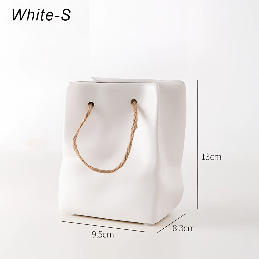 White small ceramic vase with shopping basket design featuring a rectangular shape.