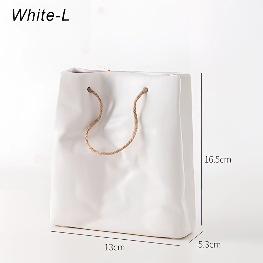 White large ceramic vase with shopping basket design.