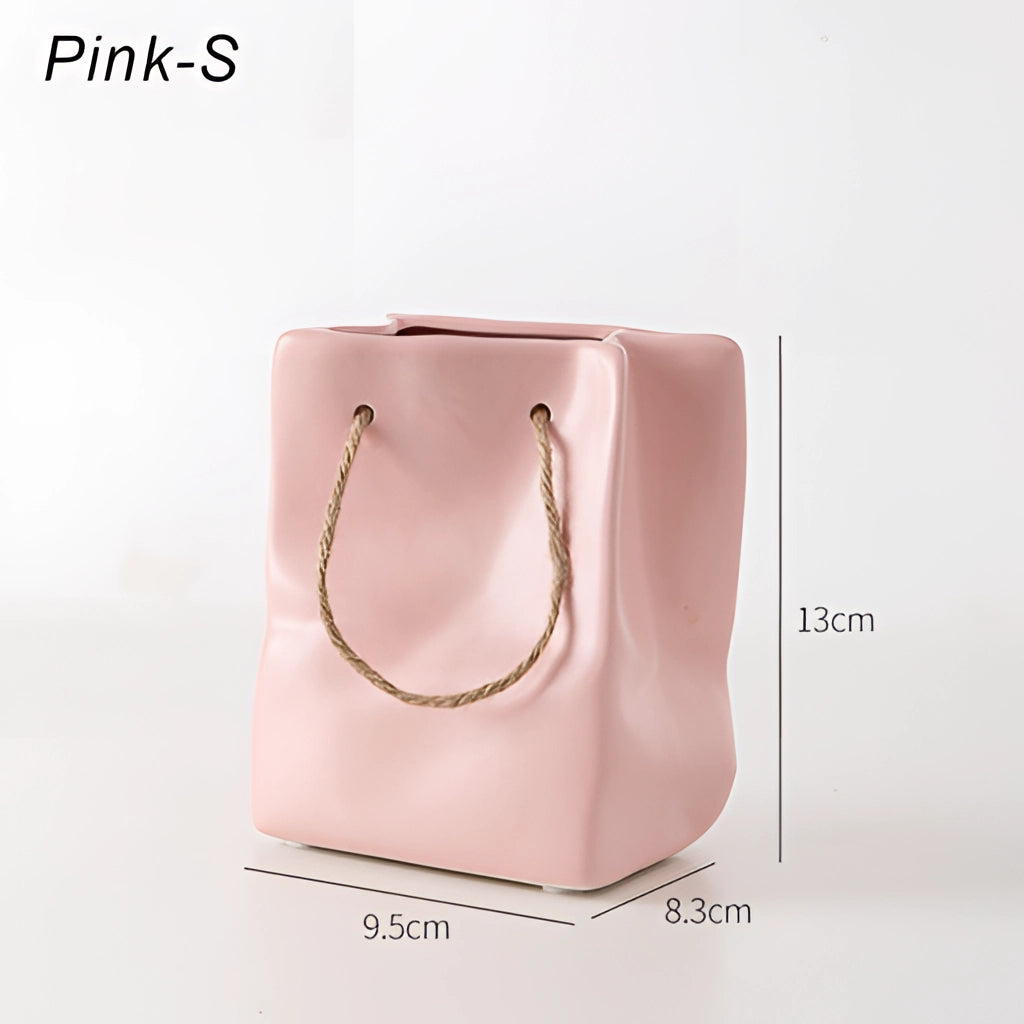 Ceramic vase with a shopping basket design in pink, small size.