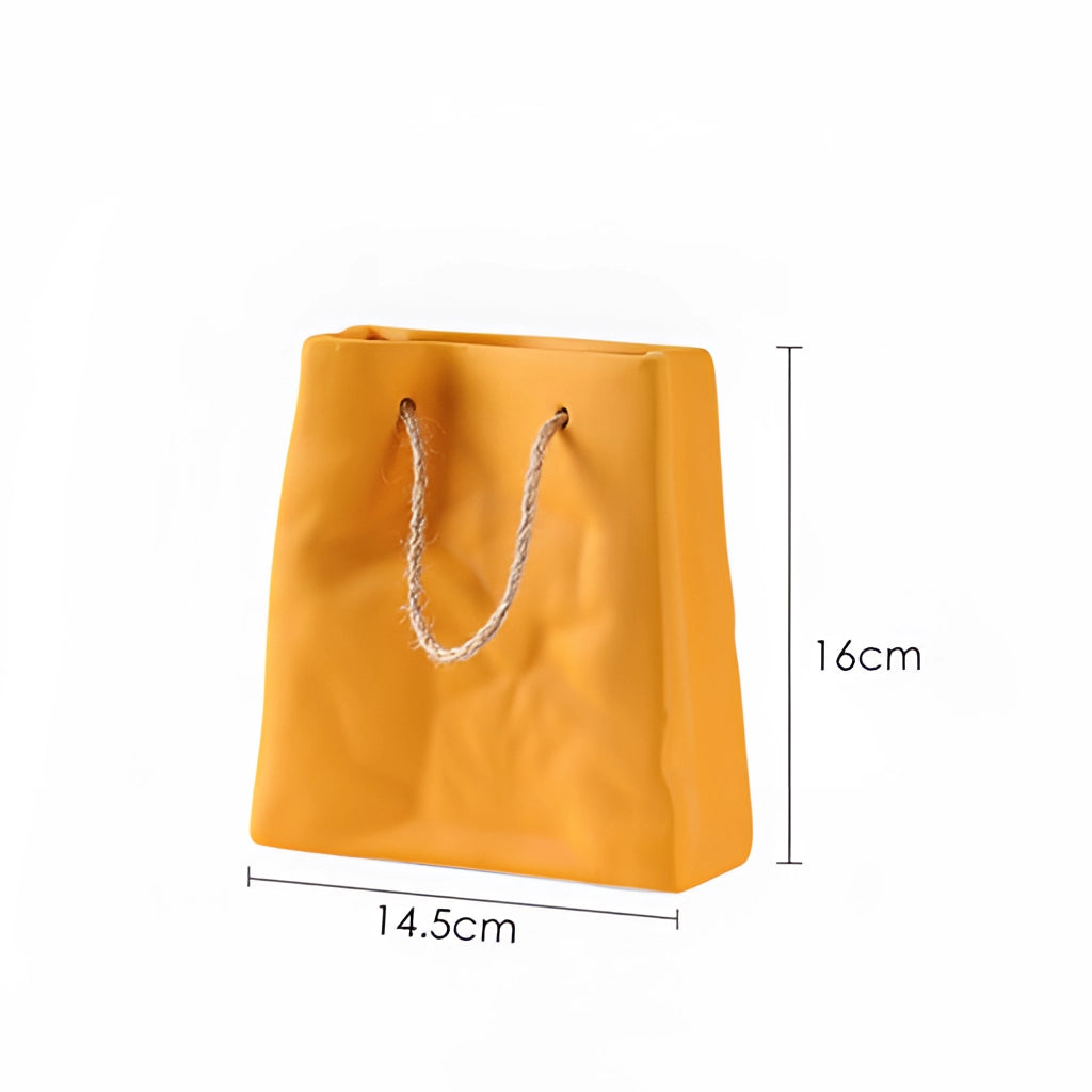 Yellow large ceramic vase with a shopping basket design.