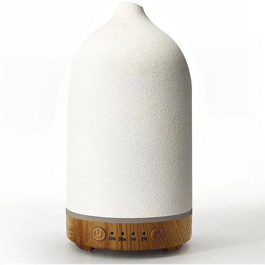 Ceramic wood grain aromatherapy diffuser with 7-color night light, cylindrical shape, beige color, and sleek design.