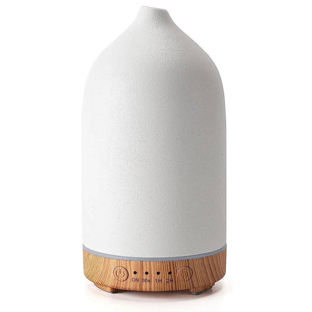 Ceramic Wood Grain Aromatherapy Diffuser with 7-Color Night Light in White, shaped like a cylinder with a wood grain design and seven-color changing LED feature.