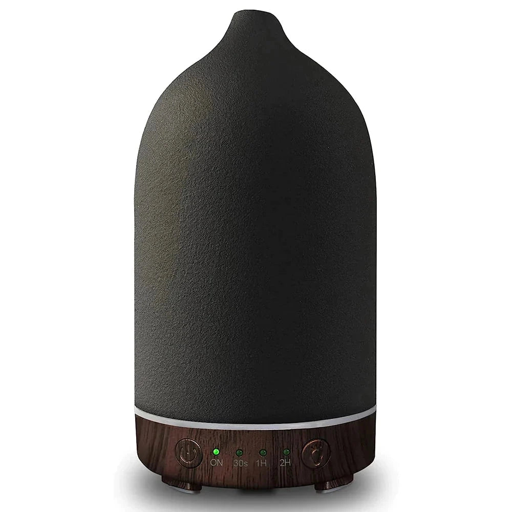 Black Ceramic Wood Grain Aromatherapy Diffuser with 7-Color Night Light, cylindrical shape.