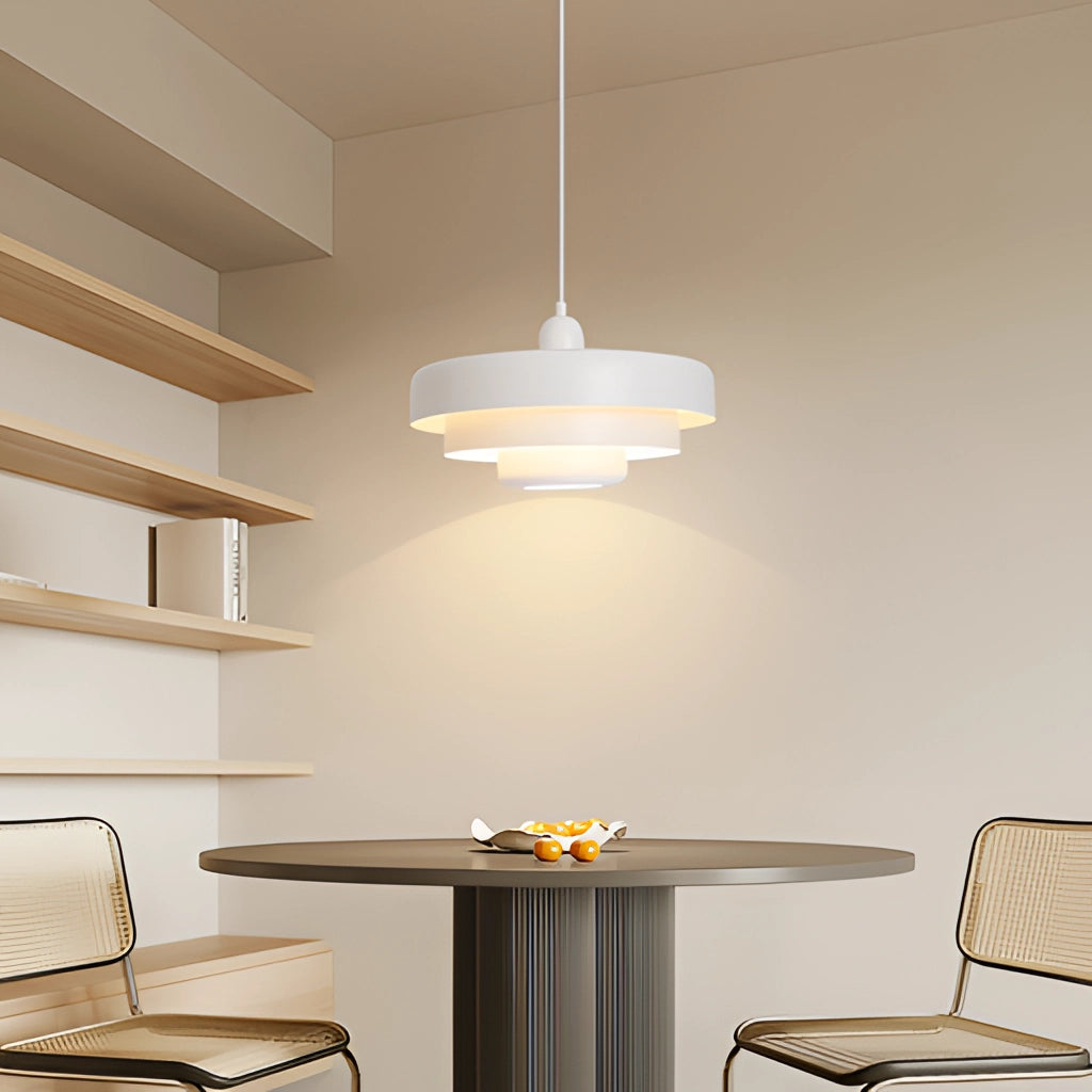 Modern Circle Design Pendant Lamp in White with 3 Color Temperatures, hanging above a wooden table and chairs in a stylishly decorated room.