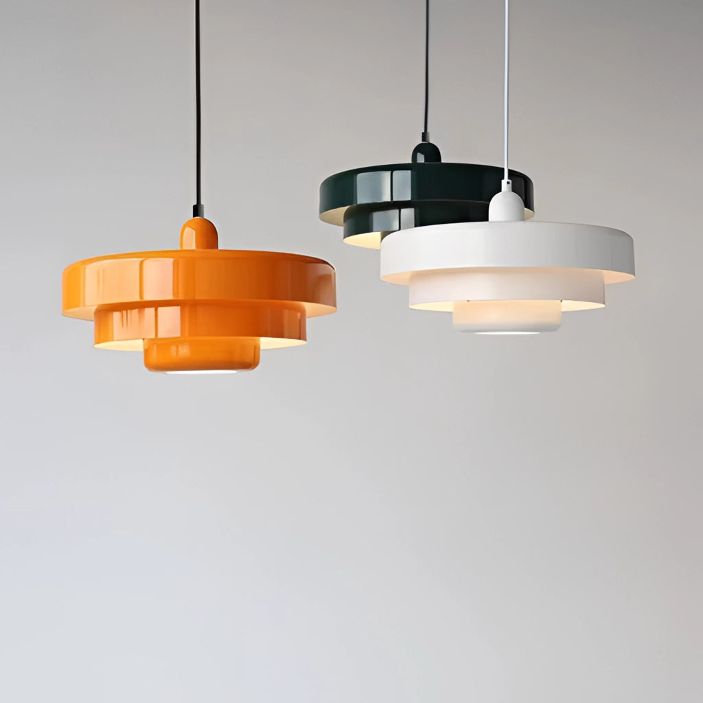 Modern pendant lamp with a circle design made from metal, featuring linked circles, hanging from the ceiling.