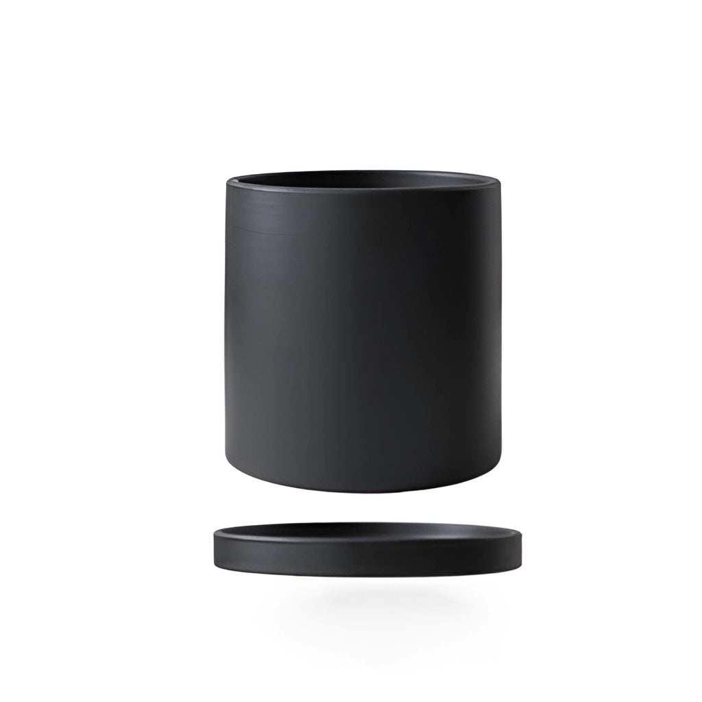 Large black ceramic planter and saucer set with a colorful design.