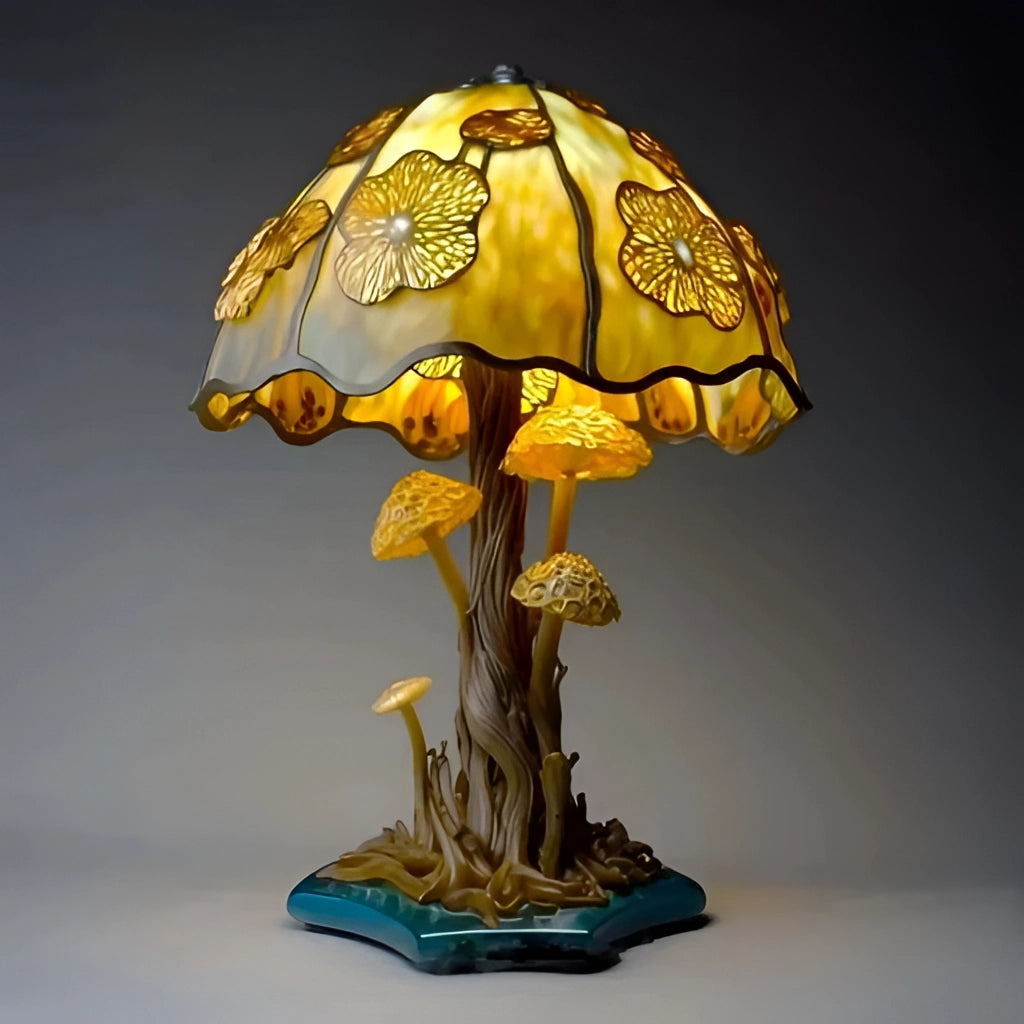 Colorful stained glass mushroom desk light on a wooden table, featuring vibrant tints and shades with an artistic lampshade design.