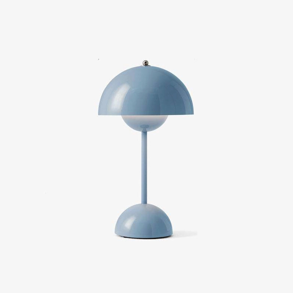Cordless blue flowerpot table lamp with touch sensor, featuring a circular lampshade and designed for long battery life, placed on a table.