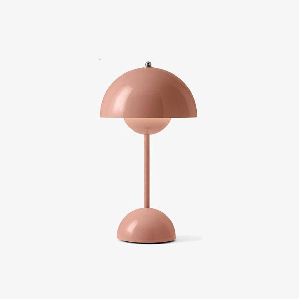 Cordless flowerpot table lamp with touch sensor in blush color, featuring a long battery life, displayed on a wooden surface with a small plant beside it.