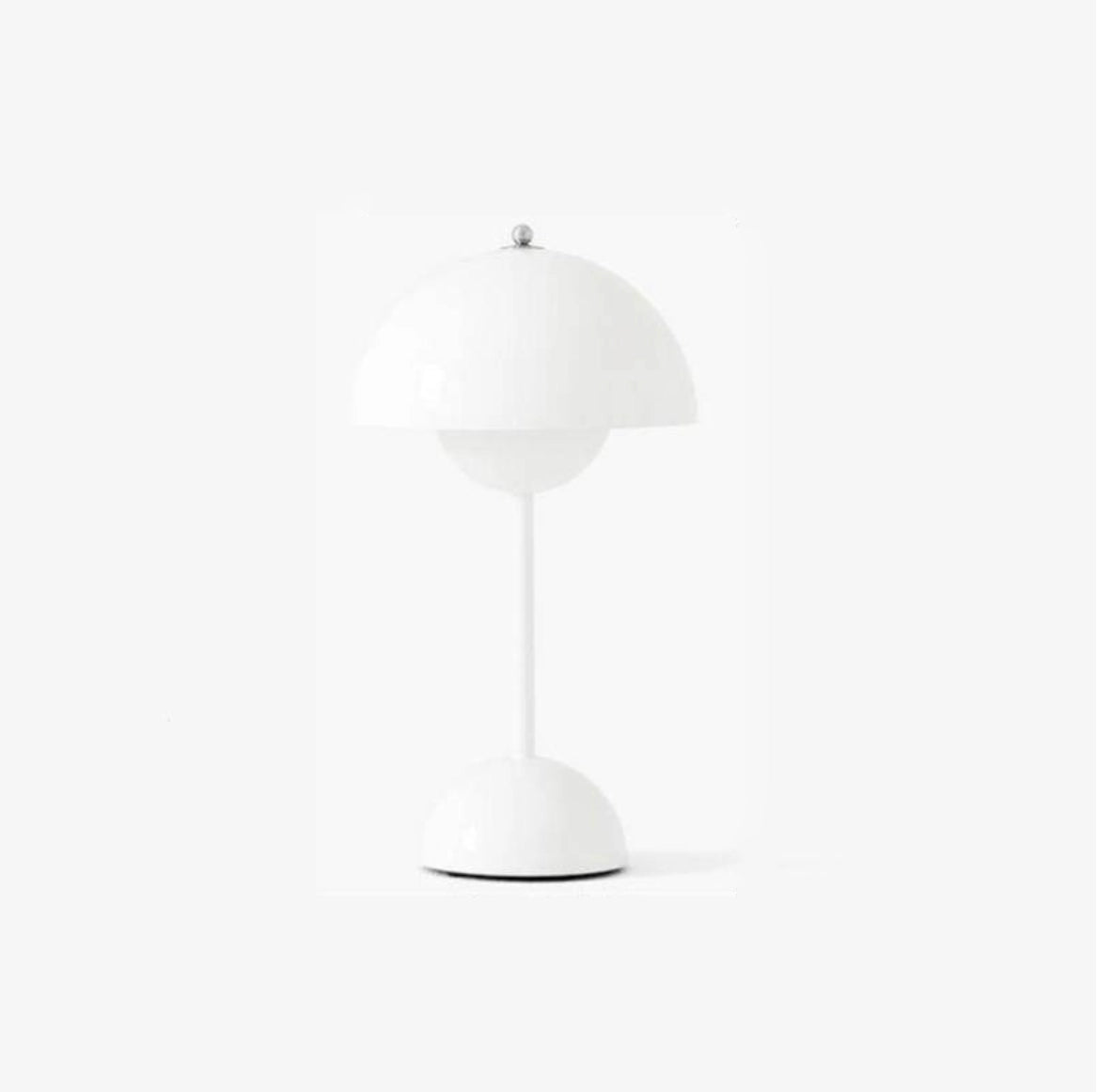 Cordless white flowerpot table lamp with touch sensor, featuring a circular lampshade and sleek metal design, placed on a table.