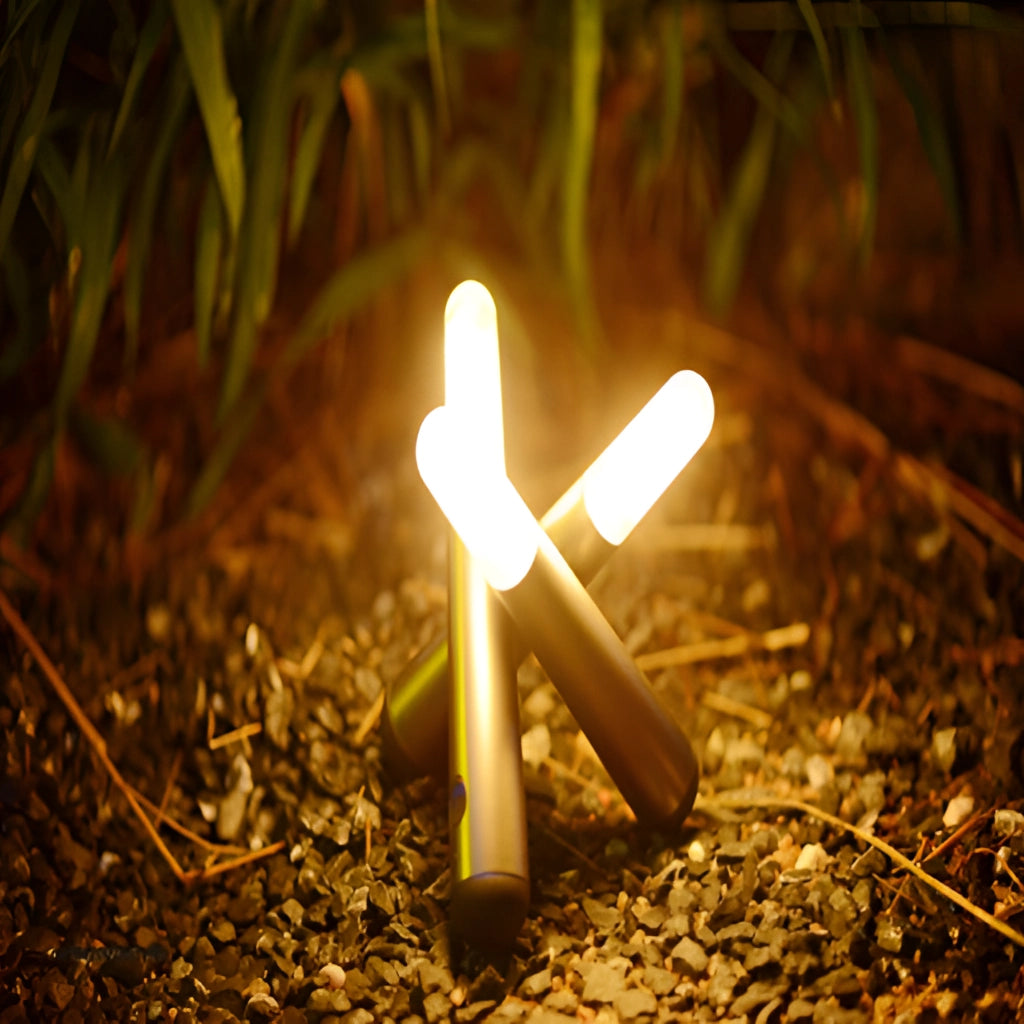 Cordless Kinetic Rotation LED Table Lamp illuminating an outdoor setting with people in nature, featuring wood and grass elements.