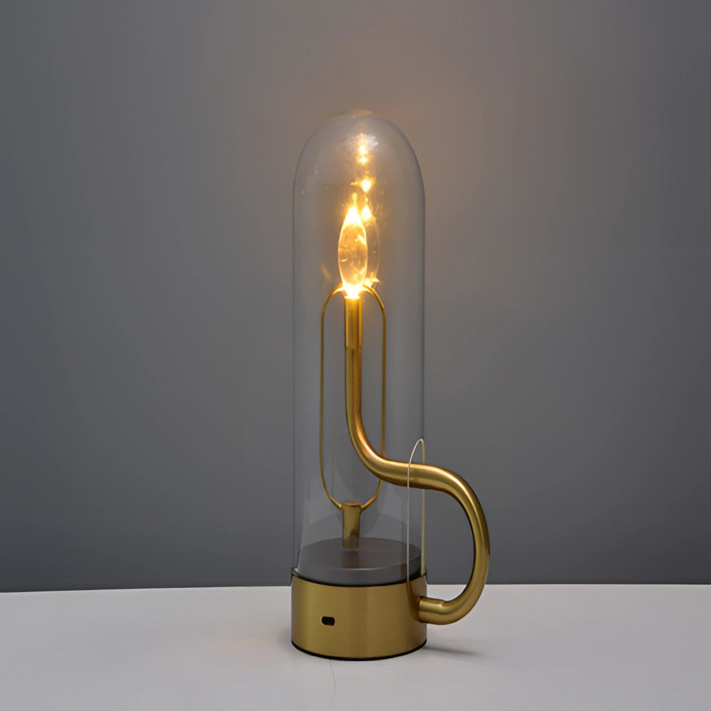 A sleek cordless LED table lamp with a cylindrical design, featuring a modern metal finish and effortless charging capabilities.
