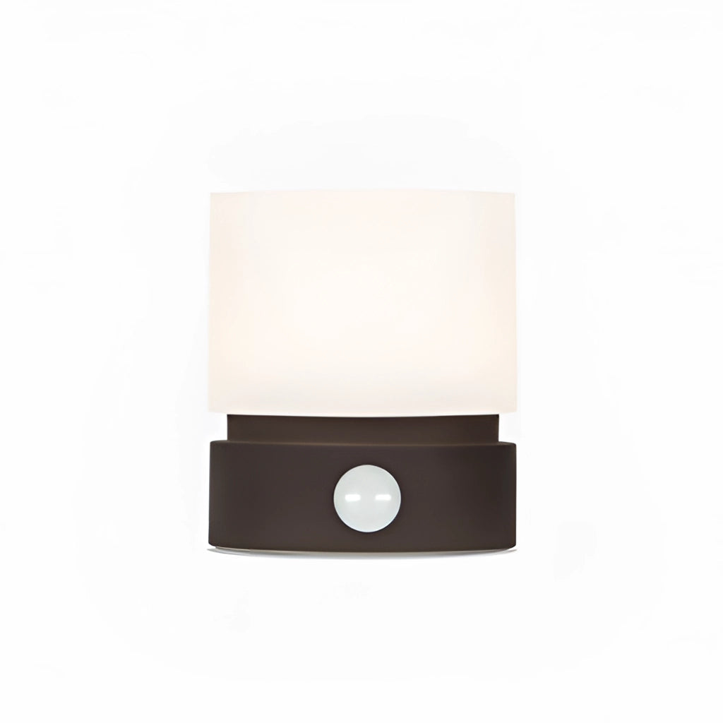 Black cordless table lamp with long battery life and adjustable brightness, featuring a rectangular base and sleek design.