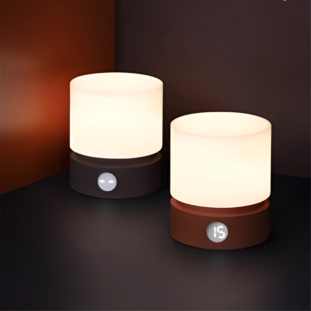 Cordless table lamp with a wooden rectangular base, ceramic body, and adjustable brightness settings.