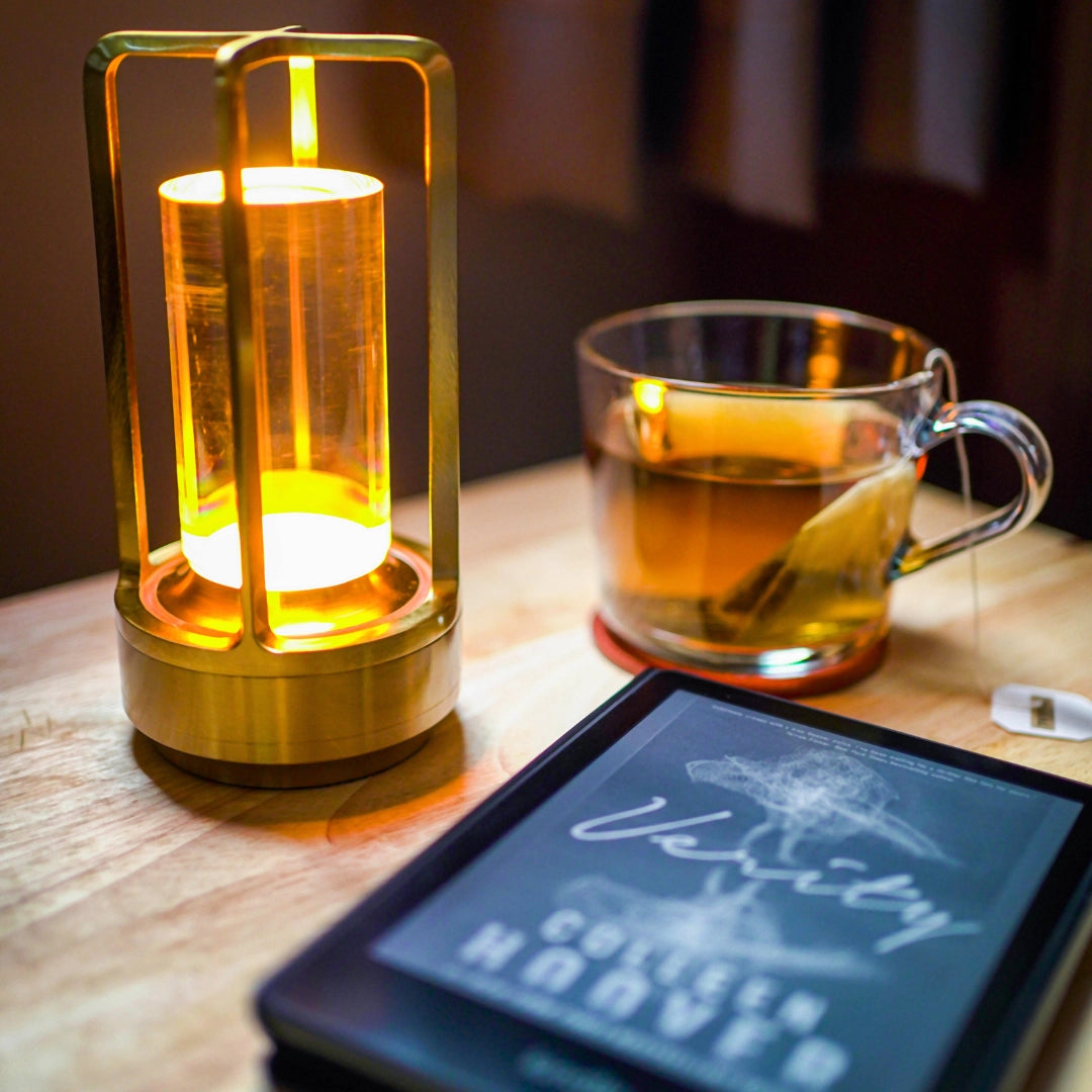 Crystal Lantern Table Lamp with Touch Sensor - Wireless LED Light on a table, resembling a candle holder with a sleek and modern design.