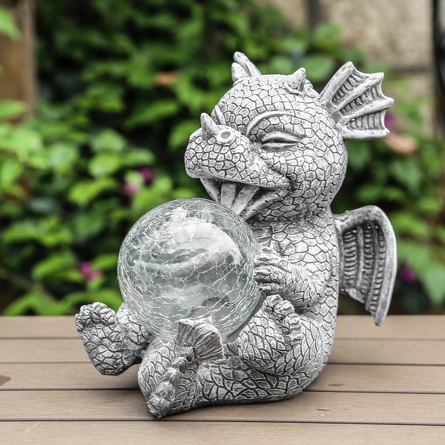 A dragon-shaped LED table lamp with intricate details resembling a sculpture, made from wood with a stylized snout and tail.