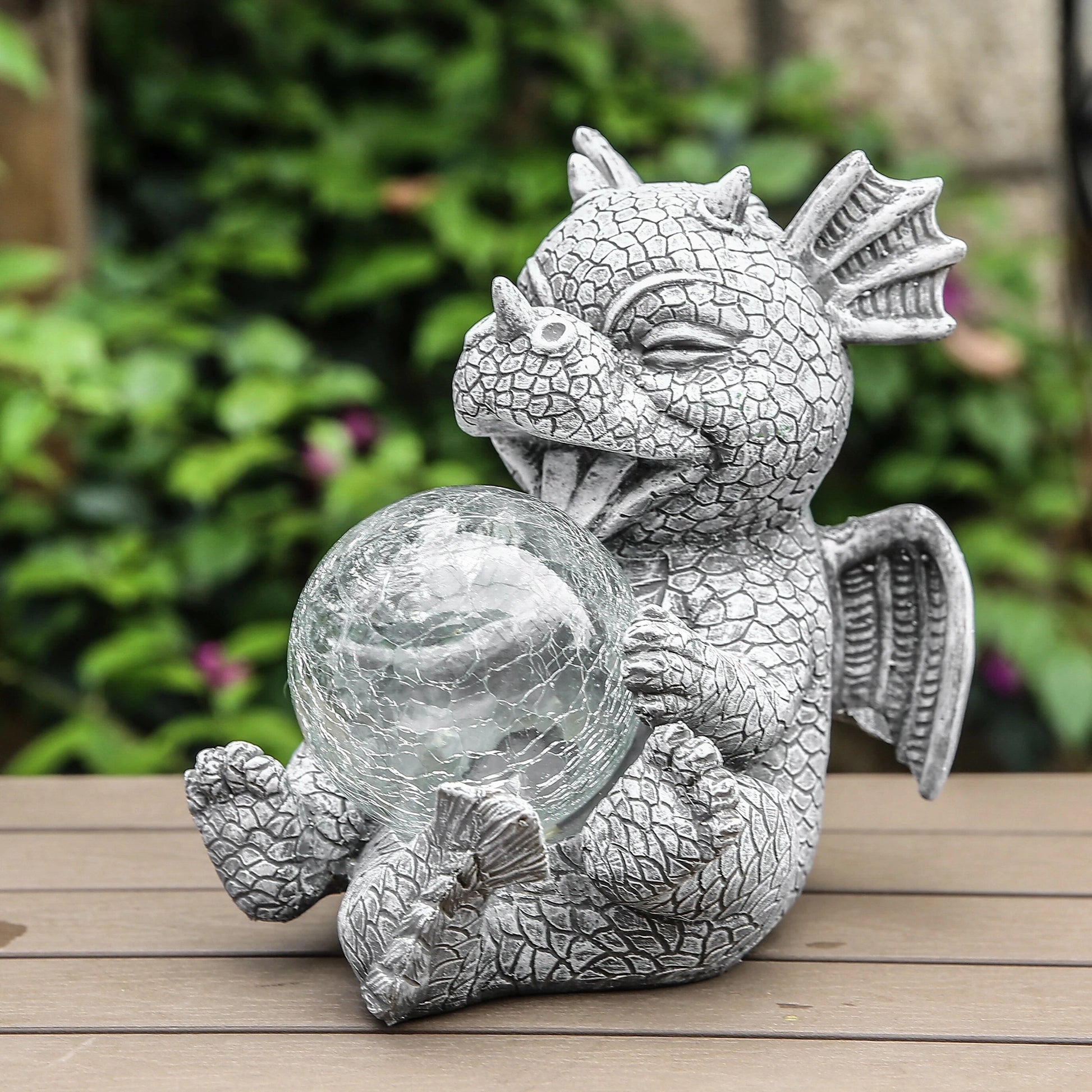 A dragon-shaped LED table lamp with intricate details resembling a sculpture, made from wood with a stylized snout and tail.
