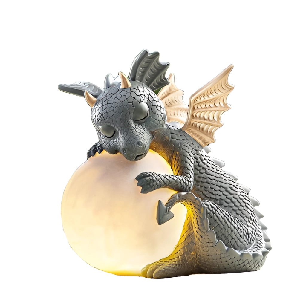 Dragon shaped LED table lamp featuring intricate wings and a metallic finish, designed as a mythical and supernatural creature, perfect as an art piece or a unique light source.