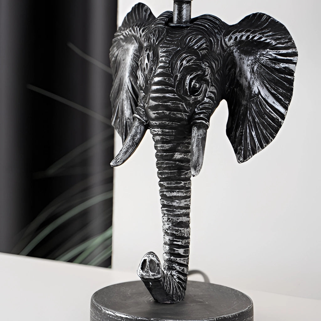Elephant design lamp featuring a white and black color scheme, shaped like an African elephant with detailed tusks, and equipped with a rechargeable battery.