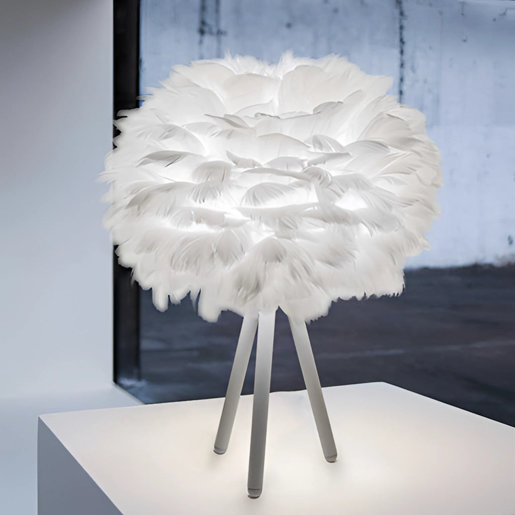 Feather LED Table Lamp with dimmable lighting, featuring a natural feather design and modern rectangular base, perfect for adding artistic elegance to any room.