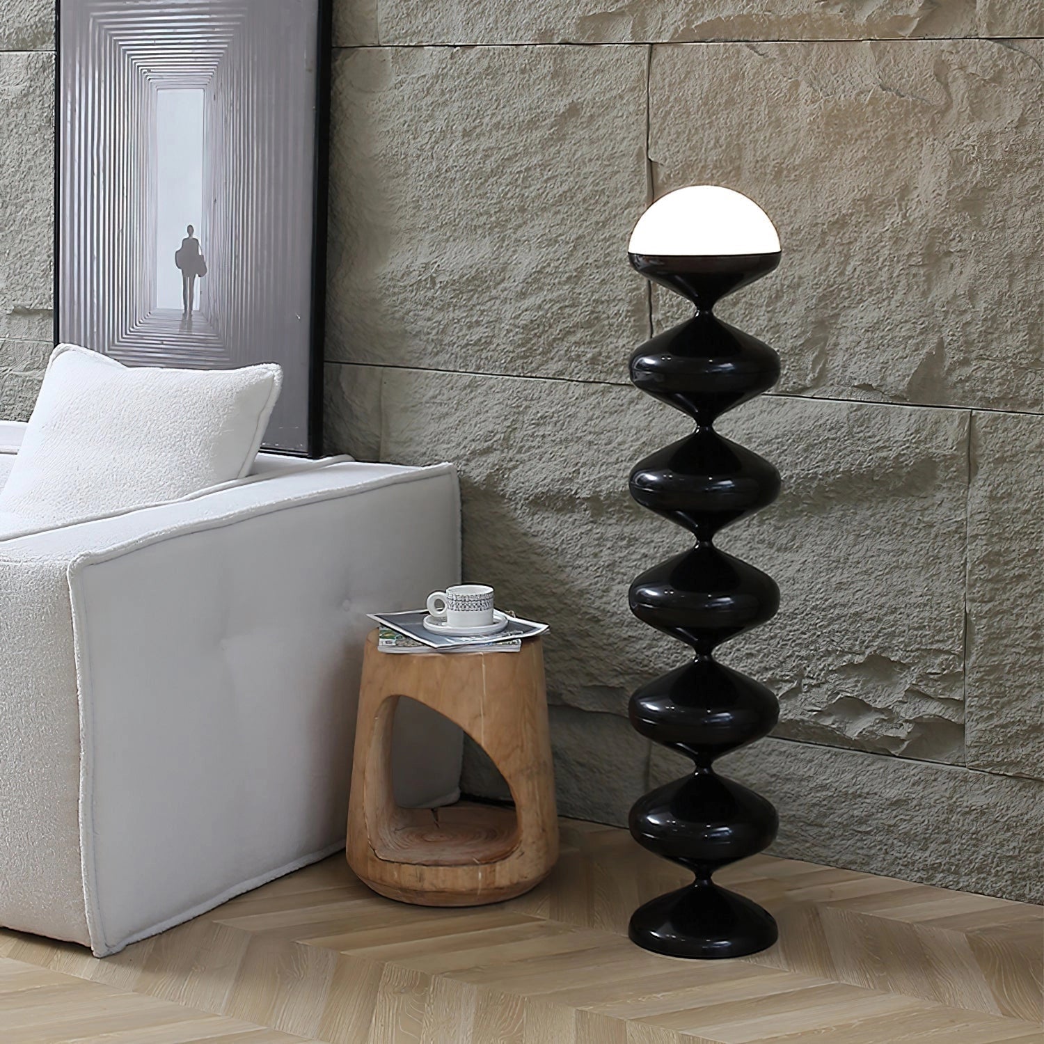 Modern elegant floor lamp with twisted gourd design, placed in a stylish interior with wood flooring and grey shelves.